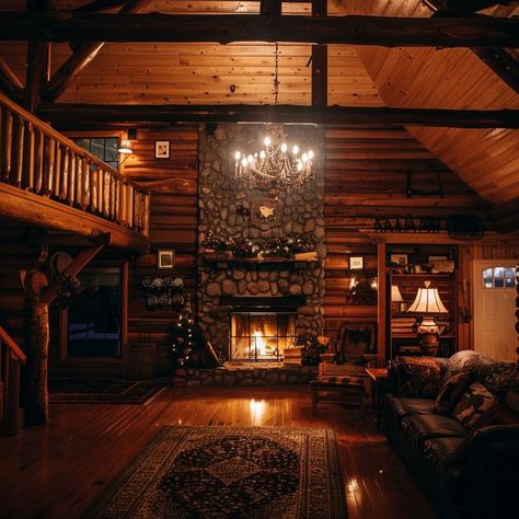 Rustic cabin interior with cozy fireplace, wooden beams, plush sofas, and holiday decor, creating a warm and inviting retreat. Cabin With Fireplace, Cozy Cabin Christmas, Rustic Cabin Interior, Cabin Fireplace, Cabin Interiors, Plush Sofa, Cabin Style, Cozy Fireplace, Wooden Beams