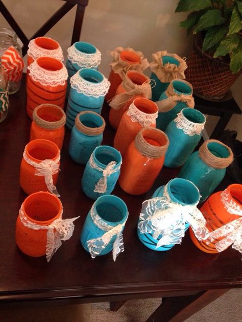 DIY wedding. Teal and orange. Chalk board. Burlap flowers. Country chic! Mason jar centerpieces. Contact mbrandon3058@gmail.com if interested in buying the lot! Teal And Burnt Orange Centerpieces, Burnt Orange And Teal Wedding Centerpieces, Fall Wedding Teal And Orange, Turquoise And Burnt Orange Wedding, Wedding Teal And Orange, Teal And Burnt Orange Wedding, Turquoise And Orange Wedding, Burnt Orange And Teal Wedding, Orange And Teal Wedding