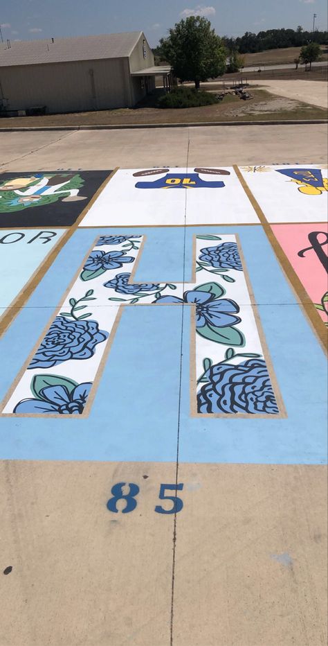 Alice In Wonderland Senior Parking Spot, Student Parking Lot Painting, Blue Parking Spot Ideas, Blue And White Parking Spot, Volleyball Parking Spot Painting, Group Parking Spot Ideas, Senior Parking Spots Chalk, Duo Parking Spot Painting, Senior Parking Spot Ideas Simple