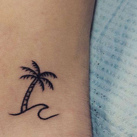 Palm Tree & Wave minimalist tattoo Palm And Wave Tattoo, Wave Tattoo With Palm Tree, Palm Tree Henna Tattoo, Small Palm Tree And Wave Tattoo, Wave Tree Tattoo, Wave With Palm Tree Tattoo, Little Palm Tree Tattoo, Palm Tree Tattoo Minimalist, Palm Tree Wave Tattoo