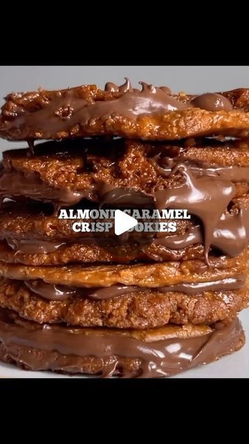 TABLE TASTE COLLECTION on Instagram: "“Table-taster” look what we found at #veganmonarchy 🤤. Try this tasty ALMOND CARAMEL CRISP COOKIES recipe.🍫🍪 📸: @veganmonarchy | Follow @tabletastecollection For More  ALMOND CARAMEL CRISP COOKIES🍪  recipe below 👇🏾 

By jacobking

👇🏾ingredients👇🏾
-4 tbsp vg butter (60g)
-80g light brown sugar
-2 tbsp maple syrup
-75g peeled almonds
-1 tsp vanilla extract
-1 tbsp gf white flour 
-hazelnut chocolate (@rhythm108 )

👇🏾method👇🏾
-melt down the sugar, butter, maple syrup and vanilla extract into a thick caramel, for around 5 minutes on a low/medium.
-blend the almonds and add them along with the flour and a pinch of salt and mix into a sticky dough.
-take a small tsp (less than a whole tsp) of the mixture and place on a lined baking tray and ba Crisp Cookies, Almond Caramel, Lace Cookies, Hazelnut Chocolate, Healthy Plant Based Recipes, Plant Based Cookbook, Caramel Cookies, Baking Tray, Healthy Sweets Recipes