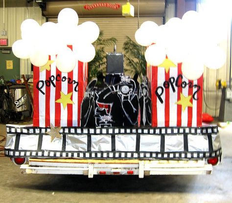 Hollywood themed float Hollywood Theme Homecoming Floats, Movie Theme Float Ideas, Red Carpet Float Ideas, Hollywood Theme Parade Float, Hollywood Theme Float Ideas, Hollywood Parade Float Ideas, Movie Themed Parade Floats, Movie Parade Float Ideas, Circus Theme Parade Float