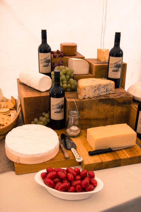 Cheese display on oak blocks Cheese And Crackers Display, Cheese Trolley, Charcuterie Shop, Cheese Station, Cheese Boutique, Food Setup, Buffet Setup, Elevated Food, Raw Cheese