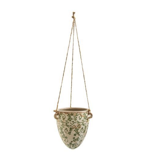 A modern take on the classic print pattern, house your faux - bulous arrangement in this floral design hanging planter The traditional ceramic vase has a homey, cozy feel that is perfect for rustic, transitional and farmhouse inspired spaces The rope is 2’ high and you can customize for your space No drainage holes and indoor use only 65 in W x 65 in D x 24 in HElevate your greenery with our exquisite decorative planters, adding a touch of elegance to any spaceLightweight and portable; can be moved around effortlessly to pair with any of your favorite plantsExperience the joys of having a stunning planter to display with faux plants that look just as beautiful as real ones, without any maintenance or upkeep Vintage Hanging Planters, Faux Hanging Plants Indoor, Hanging Planters Outdoor, Reading Lounge, Rustic Transitional, Porch Plants, Hanging Planters Indoor, Cozy Home Office, Hanging Plants Indoor