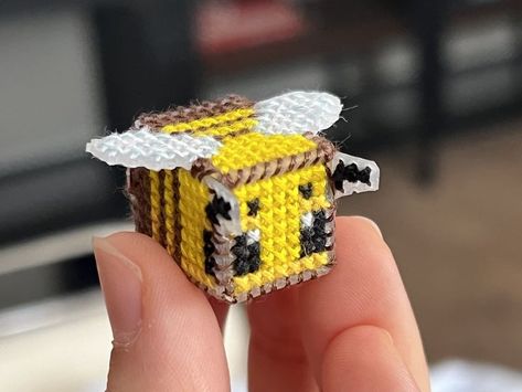 🐝🎨 Buzzing with creativity! Check out this adorable cross-stitch of the Minecraft bee! 🐝✨ Crafting the pixelated charm of the virtual world into real-life art. 🖼️🌼 Who else loves bringing their favorite games to life through crafting? 🎮 Pattern #148608 by RilWil 🌟🧵 Bee from Minecraft was made by @notorgat or bookkpalac on BB. 💛 #MinecraftBee #CrossStitchArt #PixelCrafting #braceletbook #crossstitch #minecraft #bee #spring Minecraft Bee, Orthographic Projection, Unique Cross Stitch, String Bracelet Patterns, Pixel Art Pattern, Bee Charms, Fuse Beads, Alpha Pattern, Bracelets Handmade Beaded