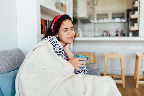 What Are the Stages of a Cold? Here's When Symptoms Usually Start—And How Long They Can Last Stages Of A Cold, Throat Remedies, Sore Throat Remedies, Dry Skin Acne, Throat Pain, Dry Throat, Throat Infection, Strep Throat, Hard Breathing