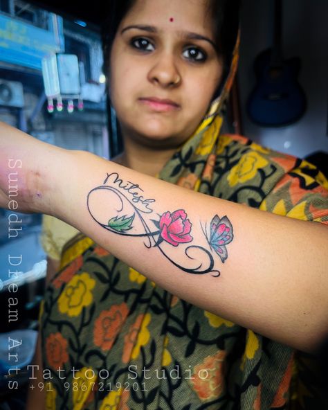 Infinity Rose Name Tattoo ❤️ . Call For Appointment☎️ 9867219201 . Check out more creative tattoos by Sumedh (@sumedh_dream_arts ) . . #besttattoostudio #forearmtattoo #smalltattoos #infinitytattoo #infinite #tattooforever Rose Name Tattoo, Infinity Name Tattoo, Last Name Tattoos, Tattoo Infinity, Kid Name Tattoo, Tattoo For Boyfriend, Rose Outline, Names Tattoos For Men, Infinity Tattoos