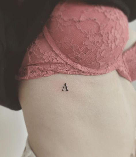 Intimate A Letter Tattoo Initial Tattoo On Ribs, Tattoo Letter A Design, Tattoo With The Letter A, As Tattoo Letter Design, A Alphabet Tattoo, Small A Tattoo Letter, Y Tattoo Letter, Hot Back Tattoos, F Tattoo Letter