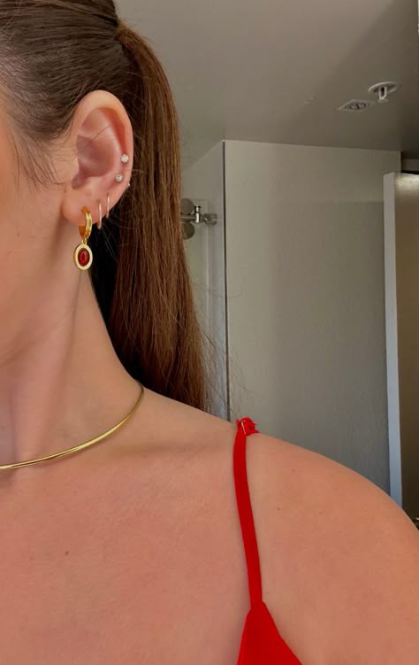 Red Dress And Gold Accessories, Red Prom Dress Jewelry Ideas, Earring Stack Inspo Gold, Red Earring Stack, Minimal Earring Stack, Red Ear Piercings, Red Dress Gold Jewelry, Red Dress Gold Accessories, Stack Piercing