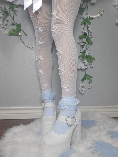 Bow tights coquette aesthetic fashion dollete aesthetic angel core white heels white and baby blue frilly socks Aesthetic Blue Accessories, Dolly Core Outfits, White Aesthetic Accessories, Angel Aesthetic Fashion, Blue Couqutte, White Tights Aesthetic Outfits, Frilly Outfits Aesthetic, Doll Core Aesthetic Outfit, Light Blue Coquette Outfit