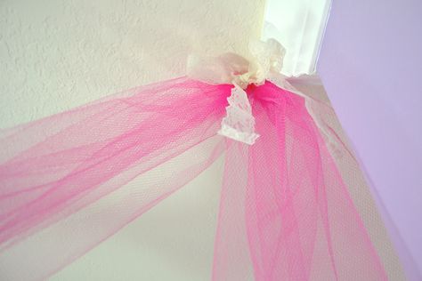 How to Drape a Ceiling With Fabric (with Pictures) Tulle Ceiling, Draped Ceiling, Classroom Ceiling, Reception Ceiling, Calm Room, Ceiling Decorations, Tulle Poms, Boho Classroom, Ceiling Draping