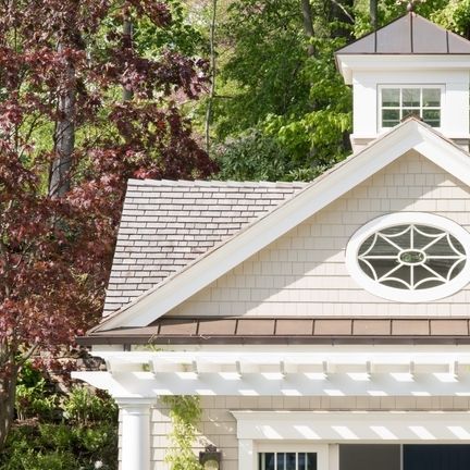 Patrick Ahearn Architect on Instagram: "Spring is in season at this newly constructed Wellesley Farms pool house, where spiderweb muntins on the oval window add character to the front-facing gable.  Architect: @patrickahearnarchitect Builder: @jwconstruction Landscape: @dangordonla Interior Design: @hardingandco Photo Credit: @emilyobrienphoto_design" Patrick Ahearn Architect, Patrick Ahearn, Oval Window, Hamptons Style, Contest Winner, We The Best, Pool House, Cottage Style, Curb Appeal