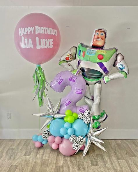 Utah Balloon Decor • Salt Lake Party & Event on Instagram: "Custom Balloons Design 🎉💚💜  * Feature: Themed balloons arrangement with matching personalized jumbo balloon.   #toystorybirthday #buzzlightyearparty #toystoryballoons #utahballoonsdecor #saltlakecityballoons" Buzz Lightyear Birthday Party, Buzz Lightyear Party, Buzz Lightyear Birthday, Balloons Design, Toy Story Party Decorations, Disney Balloons, Lake Party, Jumbo Balloons, Balloon Display