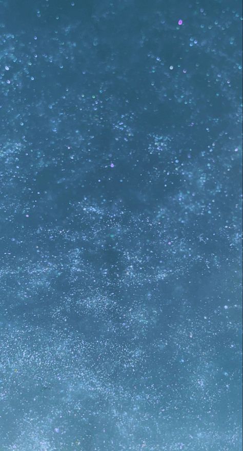 Blue glitter wallpaper. Picture of glitter in water. The color is blue. Light blue. Blue Shimmer Aesthetic, Glitter Blue Aesthetic, Light Blue Sparkle Background, Light Blue Asthetics Wallpers, Glitter Water Aesthetic, Light Blue Asthetics Photos Wallpaper, Light Blue Glitter Aesthetic, Light Blue Asthetic Wallpers, Blue Sparkles Aesthetic