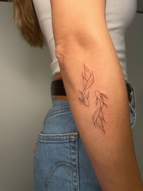 Koi Tattoo Sketch, Dainty Coy Fish Tattoo, 3 Small Tattoos In A Row, Word Coverup Tattoo Ideas, Colour Fine Line Tattoo, Joy Fish Tattoo, Back Of Arm Small Tattoo, Koi Fish Elbow Tattoo, Small Tattoo Inspo Women