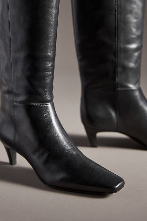 The soft leather of the Remy Knee Boots hugs your calf for a sleek silhouette. The kitten heel and snip toe combine for added edge when paired with dresses, skirts, or pants. | Remy Kitten-Heel Knee Boots by Reformation in Black, Women's, Size: 9.5, Leather/Plastic/Rubber at Anthropologie Kitten Heel Black Boots, Heel Black Boots, The Reformation, Eco Fabric, Trends 2024, Vintage Inspired Design, 50 Fashion, Cozy Fashion, Kitten Heel