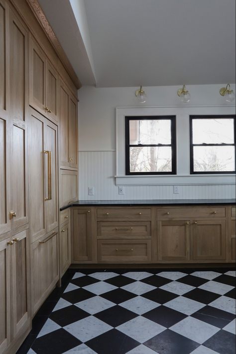 These ready-to-assemble, natural, white oak inset cabinets give this modern-cottage styled kitchen just the right amount of warmth and exudes sophistication! @cabinetjoint #kitchencabinetry #whiteoakcabinets #kitchenideas #harlequin Oak Cabinets Checkered Floor, Black And White Checkered Floor Kitchen Wood Cabinets, Checker Board Kitchen Floors, Harlequin Floor Kitchen, Black And White Tile Kitchen Floor, Black And White Checkered Floor Kitchen, White Oak And Black Kitchen, Black And White Tile Kitchen, Black And White Kitchen Floor