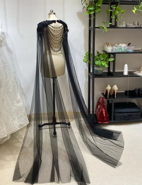 Create a stunning look to your bridal gown with this beautiful beaded crystal and draped beading cape veil. This will really add a touch of elegance to your attire and you will become a shining star.  A beautiful accessory for a wedding and an alternative to the traditional veil. It is simple to to put on and take off with a clasp fastening. The necklace part of the cape has lace applique and is studded with black beads and has draped chains of beads across the back and arms the black tulle trai Gothic Ballgown, Cape Veil Wedding, Fitted Wedding Gown, Black Lace Wedding Dress, Cape Veil, Black Lace Wedding, Tulle Cape, Shoulder Jewelry, Cape Wedding Dress