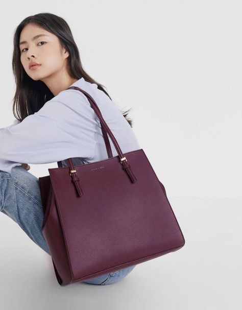 Why Everyone Needs A "Mom" Bag In Their Arsenal  #refinery29 Leather Business Bag, Best Tote Bags, Ideal Wardrobe, Mom Bags, White Tote Bag, Carryall Tote, Charles Keith, Business Bag, Work Bag