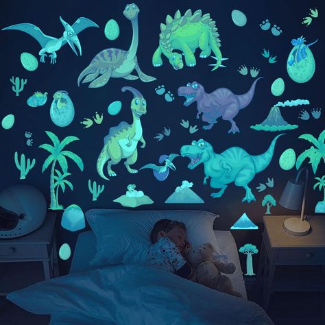 PRICES MAY VARY. GLOW DINOSAUR WALL DECALS:You will get 3 piece of luminous dinosaur wall decals in a set, including 3 assorted dinosaur super bright luminous wall stickers to turn your kid's room into a realistic dinosaur world. And soothe your child to sleep. LONG-LASTING GLOW: Just put it in the light or sunlight for 30 minutes before use the dinosaur wall stickers . It glows in the dark for 8-15 hours. The longer it absorbs light, the longer it will stay with you at night. HIGH QUALITY:The g Dinosaur Kids Room Boy Bedrooms, Dinosaur Themed Toddler Room, Boy Themed Rooms, Boy Room Ideas Dinosaur, Boy Dinosaur Room, Toddler Boy Room Decor Ideas, Dinosaur Room Ideas, Dinosaur Bedroom Ideas, Dinosaur Toddler Room