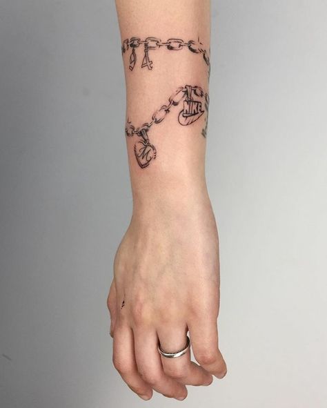 Universal Tattoo, Chain Tattoos, Braclet Tattoo, Charm Bracelet Tattoo, Bracelet Tattoo For Man, Tattoos On Arm, Butterfly With Flowers Tattoo, Wrist Bracelet Tattoo, Charm Tattoo