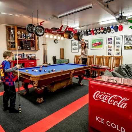 Pool table area in this multi-use garage Pool Table Garage, Garage Pool Table Room, Pool Table Area, Garage Floor Ideas, Pool Table Room, Billiards Room, Garage Floors, Cool Garages, Tool Bench