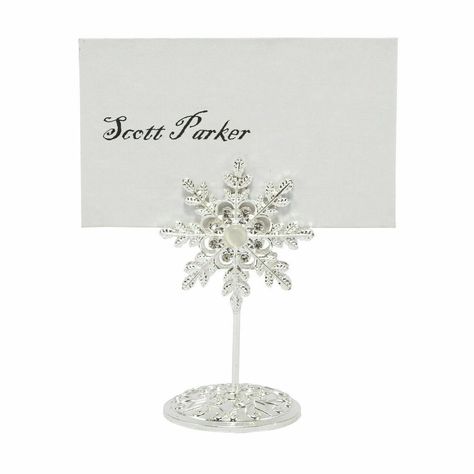 Diamante Silver Jewel Snowflake Wedding, Party Name Card and Table Number Holders Stunning diamante name card holders and table card holders Material: Metal encrusted with diamante rhinestones Add a touch of elegance to your wedding or event Great for weddings or dinner parties, as well as a decoration or a table menu for hotels, restaurants or at events Perfect for winter wonderland themed events You are able to purchase One Name Card Holder or One Table Card Holder Or Better yet You can also p Diamond Wedding Theme, Winter Wedding Table Numbers, Snowflake Wedding Theme, Winter Wedding Snow, Winter Wonderland Centerpieces, Table Numbers Wedding Elegant, Winter Wonderland Wedding Theme, Table Card Holders, Wonderland Wedding Theme