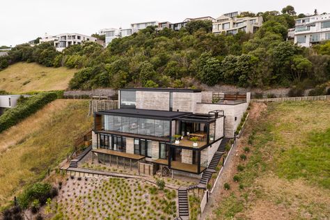 Concrete was a necessity on the very steep, geotechnically challenging site, so we chose to embrace it. Slope House Design, House On Slope, Cedar Shiplap, Sloping Lot House Plan, Slope House, Hillside House, Clerestory Windows, H Design, Exposed Concrete