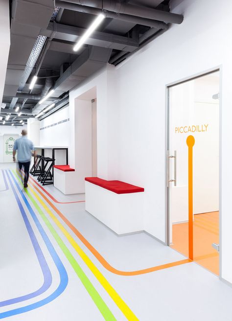 Colorful lines, inspired by the London Underground, will lead you to classrooms at this language school Interior Kantor, Floor Graphics, Kindergarten Design, Wayfinding Design, Wayfinding System, Hospital Interior, School Interior, Office Entrance, Hospital Design