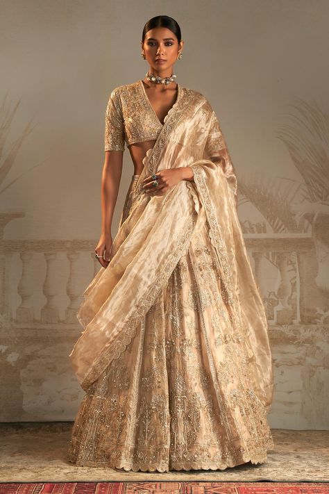 Shop for these amazing collections of Gold Blouse Net Embellished Floral Plunge V Neck Swarn Bridal Lehenga Set For Women by Ridhi Mehra online at Aza Fashions. Luxury Traditional Blouse With Chikankari Embroidery, Luxury Gold Embroidered Sets For Ceremony, Luxury Bollywood Silk Embroidered Fabric, Reka Bentuk Blaus, Tissue Lehenga, Heavy Lehenga, Ridhi Mehra, Pengantin India, Lehenga Pattern