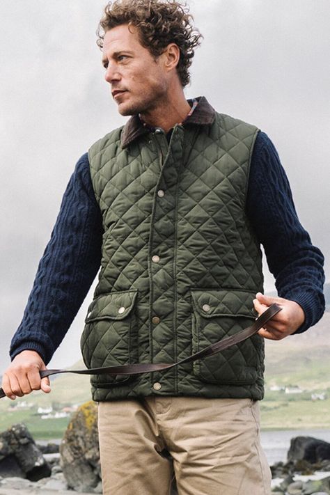 Hinter + Hobart's Mens Berwick Gilet is a classic design suited to modern life. Made with durable fabric in a diamond-quilt style and padded with PrimaLoft® Black Insulation Eco, which is made from 80% recycled material. The gilet features two front pockets, an inner patch pocket and double welt pocket to keep all your essentials safe. With its contrasting cord collar and piping - Berwick is a timeless and elegant country-to-city piece. (Ref: 050117) Customer Support message us Click to Menu Home Mens Womens Kids Equipment SKI Wear Clearance The UK’s Largest Specialist Outdoor Retailer Free Delivery On All Products Next Day Delivery Only £5.95 Hinter & Hobart Berwick Men's Gilet Casual Quilted Vest Sleeveless Padded Jacket Hinter + Hobart's Mens Berwick Gilet is a classic design suited to Green Vest Outfit, Quilted Vest Outfit, Mens Sleeveless Jacket, Double Welt Pocket, Vest Outfits Men, Quilted Gilet, Elegant Country, Outdoor Vest, Outfits Hombre