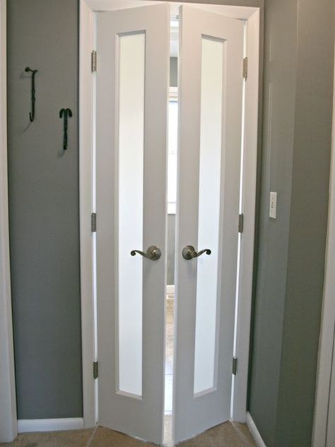 Although doors are pretty much necessary on bathrooms, sometimes it is the door that proves to be a huge obstacle to usable space. As a stylish solution, these split french doors were added to now swing out into the hallway. Frosted glass panels allow light to pass through but maintain privacy. Flush Mount Interior Doors, Clear Bathroom Door, Modern Sliding Bathroom Door, Bifold Bathroom Door Ideas, Bathroom Door Alternatives, Door Ideas For Small Spaces, Traditional Small Bathrooms, Doors For Small Spaces, Glass Bathroom Door