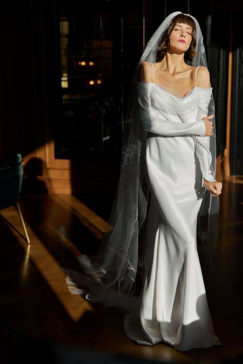 An elegant and minimalistic modern slip gown with a luxurious feel. The Juliette wedding dress is a slinky bias cut satin gown with detachable slim satin sleeves and soft rouched tulle neck and shoulder detail. Detachable Sleeves Wedding Dress, Dress With Detachable Sleeves, Satin Sleeves, Slip Gown, Sleeves Wedding Dress, Modern Gown, Detachable Sleeves, Bridal Consultant, Satin Gown