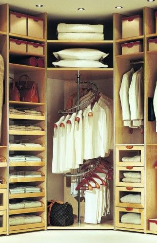 the all white wardrobe is weird but a the spiral rack is a good idea for finding hanging space... Corner Wardrobe Closet, Closet Corner, Corner Closet, Contemporary Closet, Organizar Closet, Armoire Dressing, Hanging Wardrobe, Creative Closets, Small Closet Space