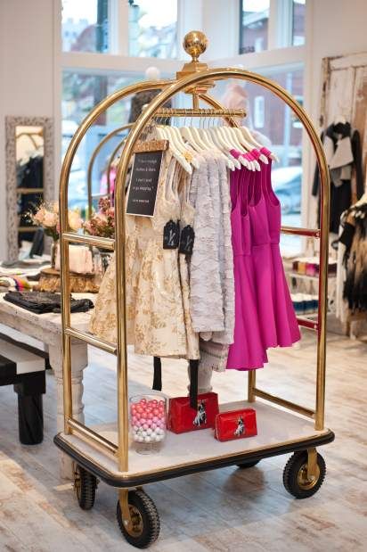 This bellman's hotel luggage cart used as a clothing rack is one of the whimsical touches to Number Fourteen Boutique in Lawrenceville. Hotel Luggage Cart, Butik Design, Asma Kat, Boutique Inspiration, Store Concept, Store Design Boutique, Boutique Display, Deco Studio, Clothing Displays