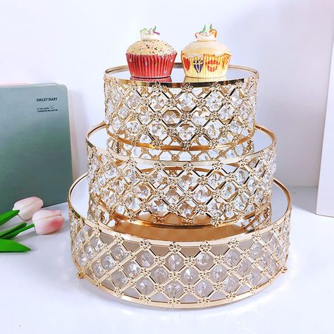 PRICES MAY VARY. 🧁【Shining Cake Stand】- Our gold cake stand is made of high quality metal, with crystal beads decoration. It will shining under the light. 🧁 【Elegant Cake Stand】- This gold cupcake stand set is very suitable for wedding, birthday party, any occasions to display your cakes desserts. 🧁 【Product Size】- Our crystal cake stand include 3pcs/ set. Dimensions: S: 8 inch; M: 10 inch; L: 12 inch. 🧁 【Easy to Use】- This dessert cake stands are very easy to use. Mirror top is easy to clea Cookie Display Stand, Pedestal Display, Cupcake Wedding, Dessert Display Stand, Gold Cake Stand, Metal Cake Stand, Cake Stand Set, Cake Rack, Cake Stand Display