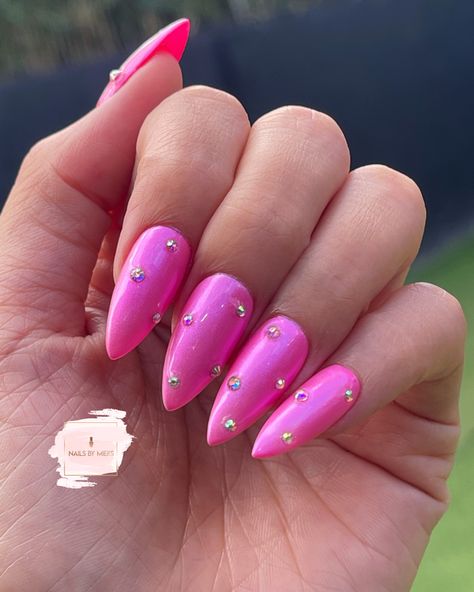 Pink Chrome Glitter Nails, Barbie Pink Nails With Rhinestones, Hot Pink Nails With Diamonds Rhinestones, Hot Pink Nails With Jewels, Hot Pink Rhinestone Acrylic Nails, Hot Pink Jeweled Nails, Hot Pink Nails With Pearls, Pink Prom Nails Acrylic Almond, Pink Chrome Nails With Pearls