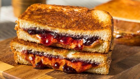 Swap Your Midnight Grilled Cheese For A Grilled PB&J Sandwich — Chowhound Grilled Cheese Recipes Gourmet, Peanut Butter Jelly Sandwich, Peanut Butter And Jelly Sandwich, Gourmet Grilled Cheese, Goat Cheese Tart, Jelly Sandwich, Cheese Tarts, Grilled Cheese Recipes, Gooey Cheese