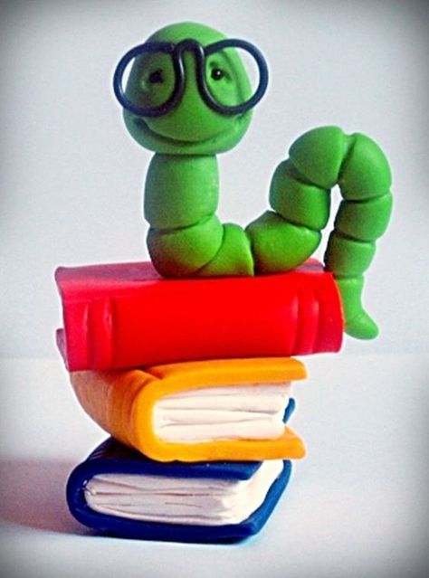 This listing is for one Bookworm Polymer Clay Sculpt.    This adorable little guy, his books were handmade by me using a blend of polymer clays and: