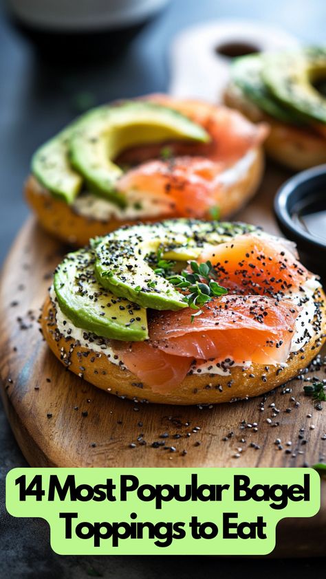 A toasted bagel topped with cream cheese, smoked salmon, avocado slices, and a sprinkle of herbs on a wooden board. Bagel Bar Display, Sandwich Bagel Ideas, Bagel Station Brunch, Bagel Cream Cheese Toppings, Bagels With Salmon And Cream Cheese, Salmon Avocado Bagel, Best Bagel Toppings, Bagel Burger Ideas, Everything Bagel Topping Ideas