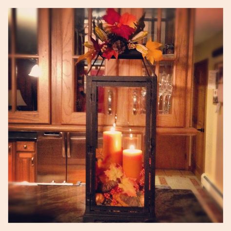 Fall Decor Ideas - good idea for kitchen table centerpiece- maybe with a little smaller lantern Fall Front Porch Decor With Lanterns, Lantern Filler Ideas, Fall Lanterns, Large Lantern, Fall Lantern, Harvest Decor, Lantern Ideas, Fall Kitchen Decor, Fall Thanksgiving Decor