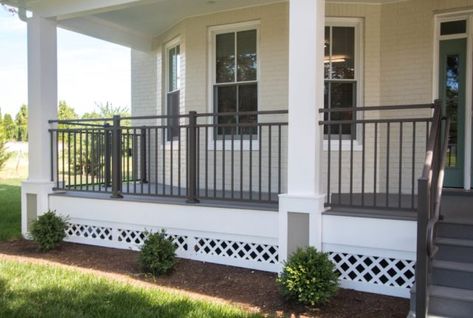 Black Rod Iron Railing Front Porch, Black Outdoor Railing Front Porches, Aluminum Railing Front Porches, Porches With Black Railings, Black And White Front Porch Railing, Front Porch Steel Railing Ideas, Front Porch Metal Railing Ideas, Vinyl Front Porch, Black Front Porch Railing