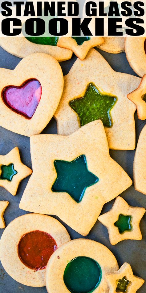 STAINED GLASS COOKIES RECIPE- Quick, easy, made with simple ingredients. Learn how to make beautiful classic Christmas sugar cookies that are filled with rock candy like Jolly Rancher or Life Savers. Can be decorated with royal icing, marshmallows and sprinkles. Fun Holiday project for kids. From CakeWhiz. Window Cookies, Glass Cookies, Christmas Sugar Cookie Recipe, Dessert Christmas, Quick Cookies Recipes, New Year's Desserts, Stained Glass Cookies, Best Christmas Cookie Recipe, Tiramisu Dessert