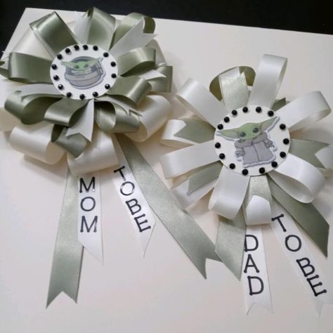 Star Wars Baby Yoda Baby Shower Corsages Perfect For A Baby Shower With Star Wars Baby Yoda Theme. It Can Be Worn As A Corsage For Mom To Be. The Dad To Be Can Also Join In The Fun With A Dad To Be Bow Tie. Includes: Handmade/Brand New --Olive Green Wide Ribbon --Ivory Wide Ribbon --"Mommy To Be" And "Daddy To Be" Black Letters Baby Yoda On Ivory Card Stock Return Policy I Do Not Accept Returns Or Exchanges On My Corsages, Ties, And Capias. Starwars Baby Shower Ideas, Star Wars Themed Baby Shower Ideas, Star Wars Baby Shower Favors, Baby Yoda Baby Shower Ideas, Star Wars Baby Shower Ideas, Baby Shower Corsages, Mexican Bridal Showers, Star Wars Baby Shower, Wedding Chair Signs