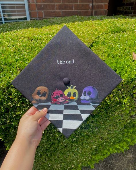 Five Nights at Freddys design 🩷 Only booking grad caps for June 18th and forward! Book through my website only 🩷www.advbellearts.com __________ #advbellecaps #gradszn #classof2024 #gradcapdesign #gradcapideas #fnaf Motley Crue Graduation Cap, I Held On Till May Graduation Cap, Twd Graduation Cap, Caps For Graduation Ideas, Studio Ghibli Graduation Cap Ideas, Splatoon Graduation Cap, Artistic Graduation Cap, Steven Universe Grad Cap, Fnaf Grad Cap