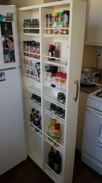 Hidden Fridge Gap Slide-Out Pantry : In this Instructable, you will learn how to steal some much needed kitchen storage, and not take up any more room in doing so.I live in a small apartment with an even smaller kitchen that is lacking in the storage department. So I needed a new cab... Hidden Refrigerator, Hidden Fridge, Narrow Pantry, Slide Out Pantry, Diy Pantry Organization, Cabin Diy, Hidden Pantry, Kitchen Furniture Storage, Refacing Kitchen Cabinets