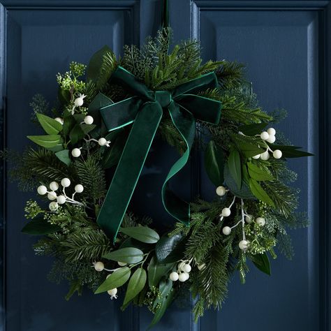 Mistletoe and pine with a luxurious green bow make this rich faux wreath a winner in the decorative stakes. Suitable for indoor use. Size H48.3, D10.2cm. Inner diameter 20, Outer diameter 28cm. Made from polyethylene. Pre-decorated . Fixtures included. Keep decoration away from heat and sources of ignition. Faux Christmas Wreath, Window Wreaths Indoor, Forest Green Christmas Decor, Green Wreaths For Front Door, Xmas Wreaths For Front Door, Hunter Green Christmas Decor, Green And White Christmas Decor, Green Christmas Garland, Emerald Green Christmas