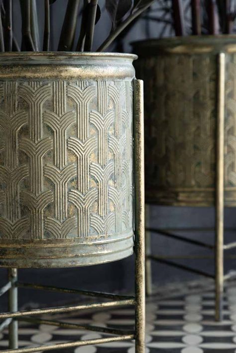 About The Set Of 2 Antique Gold Patterned PlantersThe Set Of 2 Antique Gold Patterned Planters are the perfect base for displaying your houseplants in style. Made from metal with a fabulous geometric pattern across the surface, the plants have an aged gold finish that reminds us of the rustic charm of Verdigris. Designed as a set, the larger raised planter measures H49cm x W31cm x D31cm, while the smaller raised plant pot measures H43cm x W25cm x D25cm. Why We Think You’ll Love The Distressed Go Art Deco Plant Pots, Art Deco Plant, Gold Planter, Brass Planter, Raised Planter, Indoor Plant Pots, Large Planters, Instagram Tags, Modern Sculpture