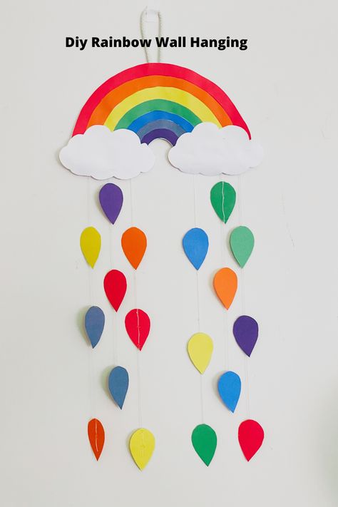 Rainbow Hanging Crafts, Construction Paper Rainbow, Wall Hanging Craft Ideas With Paper For School, How To Make Rainbow, Rainbow Hanging Decor, Rainbow Wall Hanging Diy, Rainbow Paper Craft, Diy Rainbow Wall, Thread Macrame