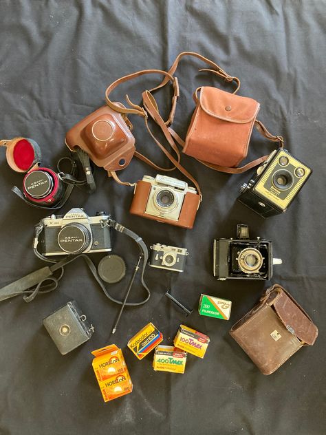 Here you have a collection of old analogue/film cameras: - Asahi Pentax K1000 with 2 lenses. This camera is great and works well, as I used it for some years and never had any issue. It goes with the trigger.  - Agfa Ambi Silette, with a 50mm lens. This was known as the "Leica of the poor", because it's very good, and less expensive. The camera always worked well, it was my very first camera, and it has the original leather case.  Both had only one owner-photographer: me.  - a Minox Minoctar, wi Film Camera Collection, Digital Camera Collection, Old Film Camera, Vintage Camera Collection, Things To Collect, Miniature Camera, Film Camera Photography, Pentax K1000, Camera Collection